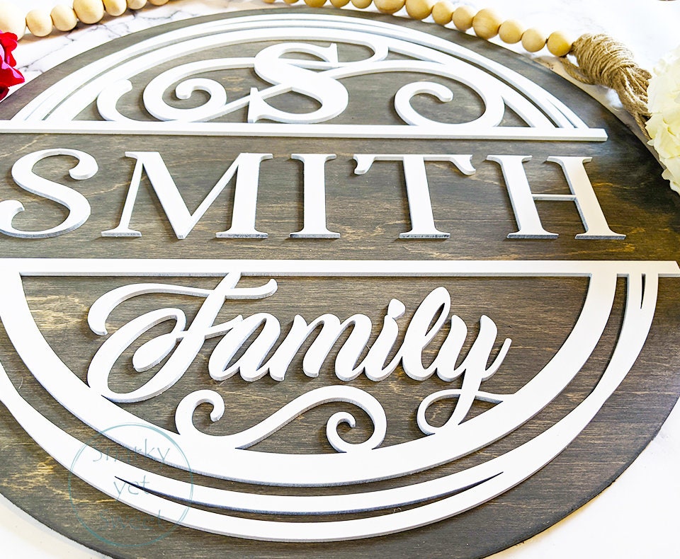 Family monogram laser cut door hanger