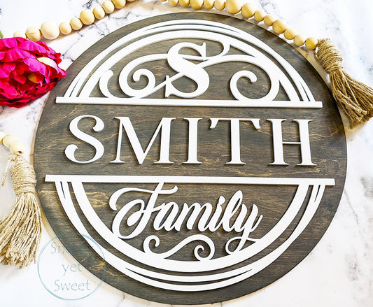 Family monogram laser cut door hanger